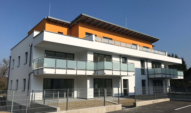 Wohnanlage und Geschäftsgebäude Bruck Waasen